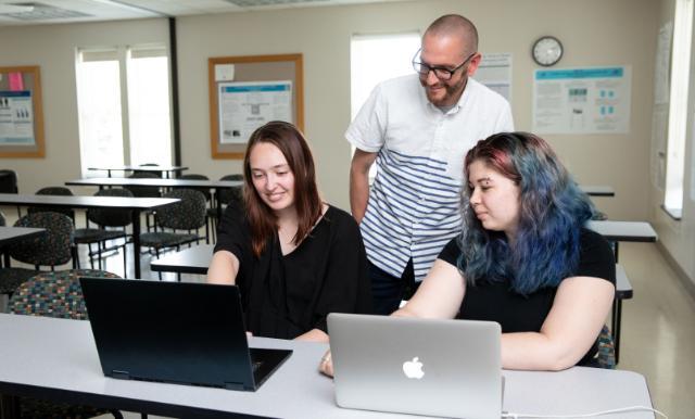 Dr. Timothy Ritzert with Kylie Gannon ‘23 and Leah Richardson ‘23